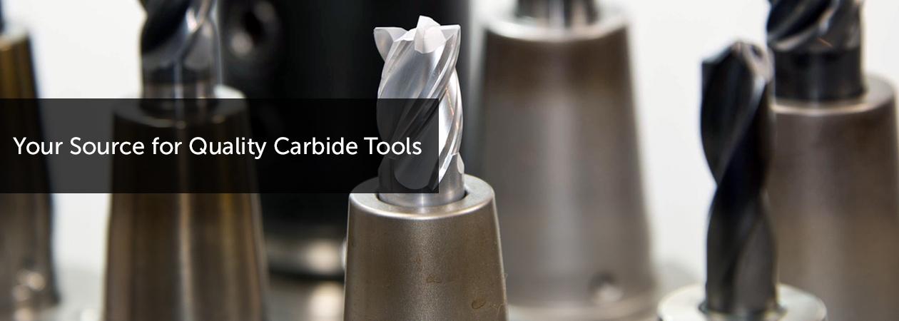 Text 'Your Source for Quality Carbide Tools' over a photo of carbide drill bits